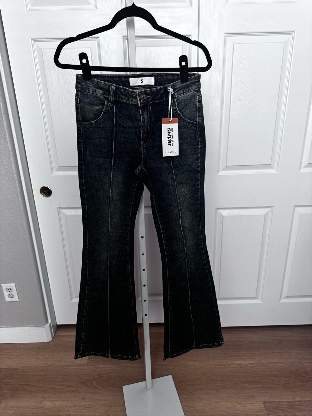 Classic Black Washed Flare Jeans with Contrast Seams